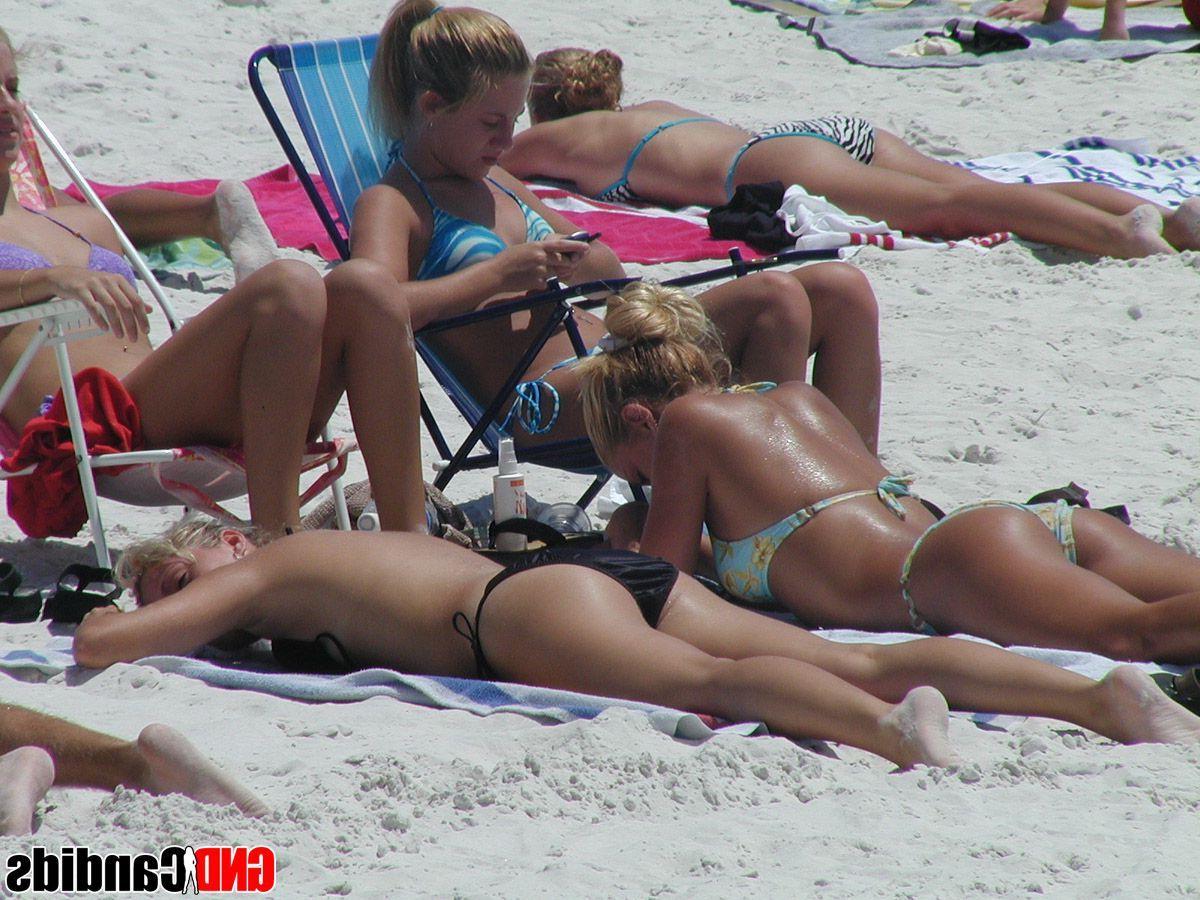 12P Pictures of hot and horny bikini girls on the beach