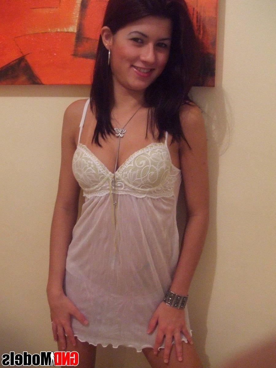 12P Pictures of a sexy brunette girl in white lingerie