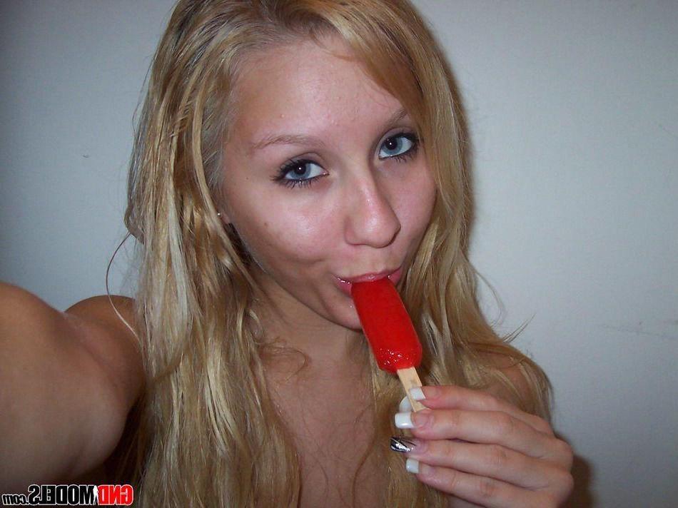 12P Pictures of a beautiful blonde girl showing off