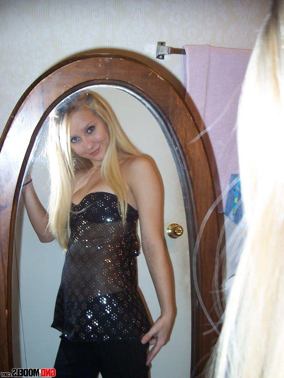 12P Pictures of a beautiful blonde girl showing off