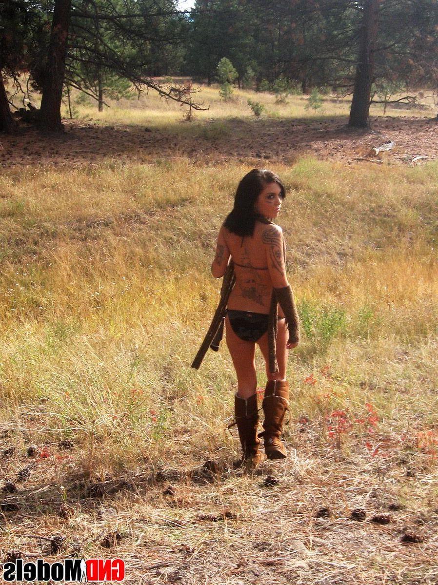 12P Pictures of a hot teen girl with a gun
