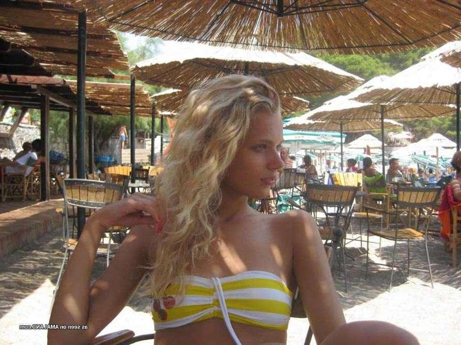 16P Gorgeous blonde teen wearing sexy bikinis at the beach