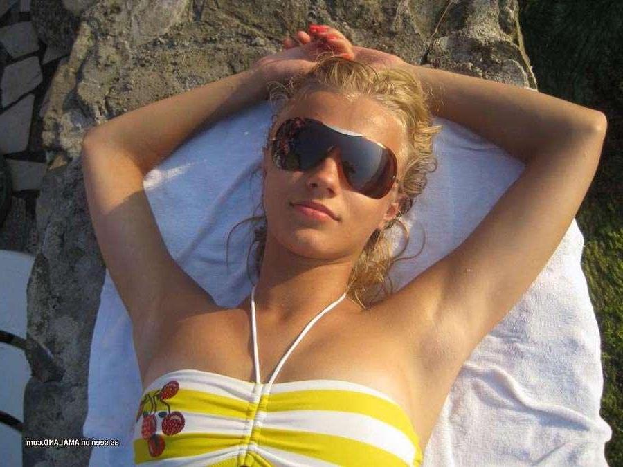 16P Gorgeous blonde teen wearing sexy bikinis at the beach
