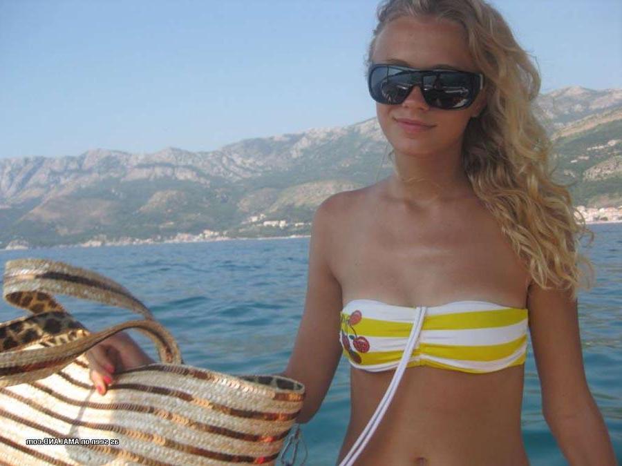 16P Gorgeous blonde teen wearing sexy bikinis at the beach
