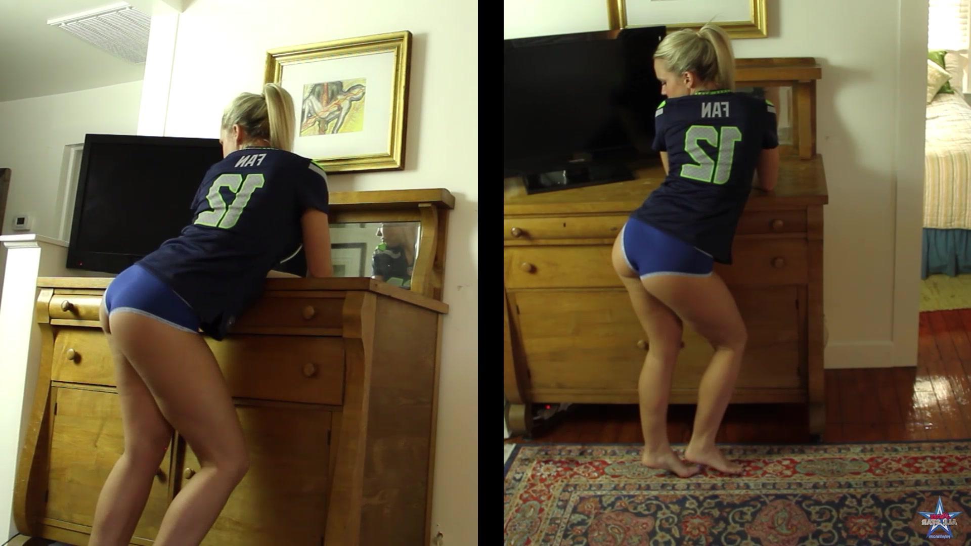 16P Blonde Assult babe Kandie is back, shaking her booty and stripping out of a football jersey in the living room!