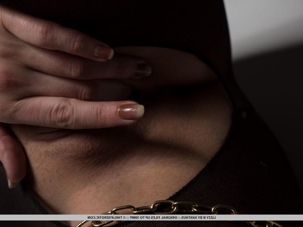 16P Blonde hottie Lizzy B is chained up for you in "Golden Touch"