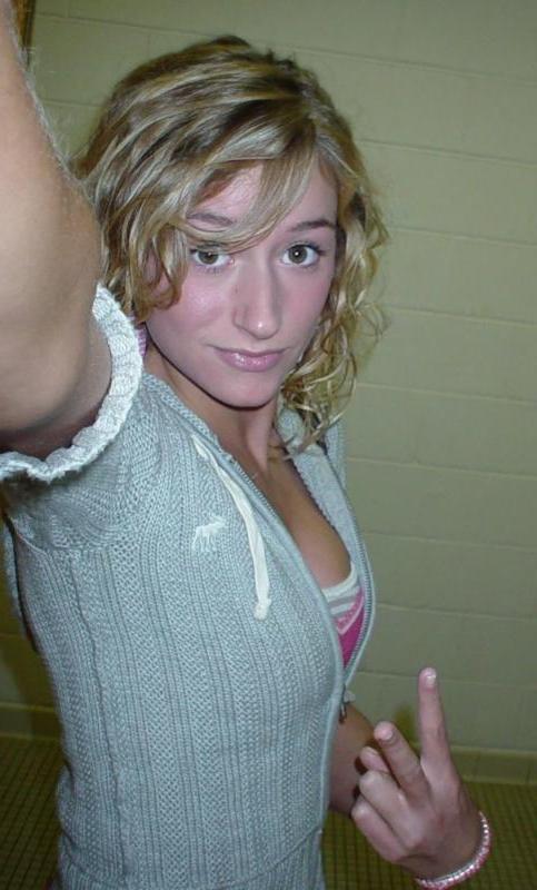 14P Blonde amateur chick teases by posing sexy