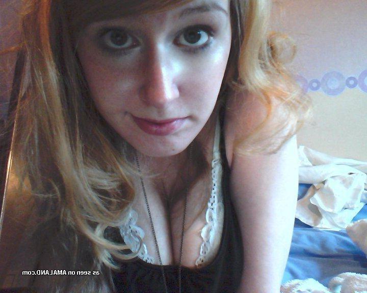 14P Pics of a gorgeous self-shooting redhead hottie with big tits and smooth pussy