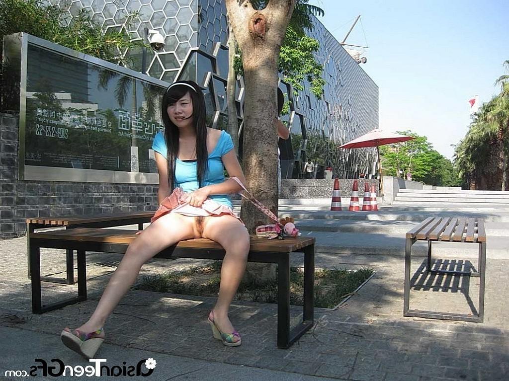 10P Horny young girl shows her hairy cunt in public