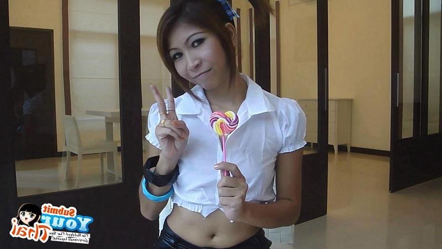 16P Sexy schoolgirl Thai baby named O sucks a lolipop and shows off her bald pussy