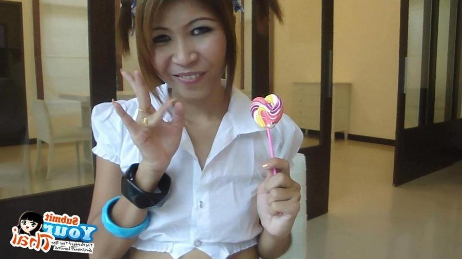 16P Sexy schoolgirl Thai baby named O sucks a lolipop and shows off her bald pussy