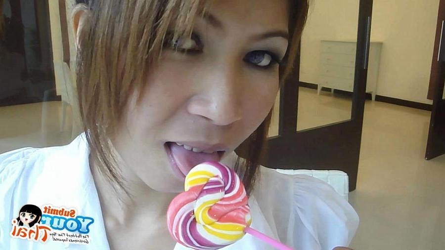 16P Sexy schoolgirl Thai baby named O sucks a lolipop and shows off her bald pussy