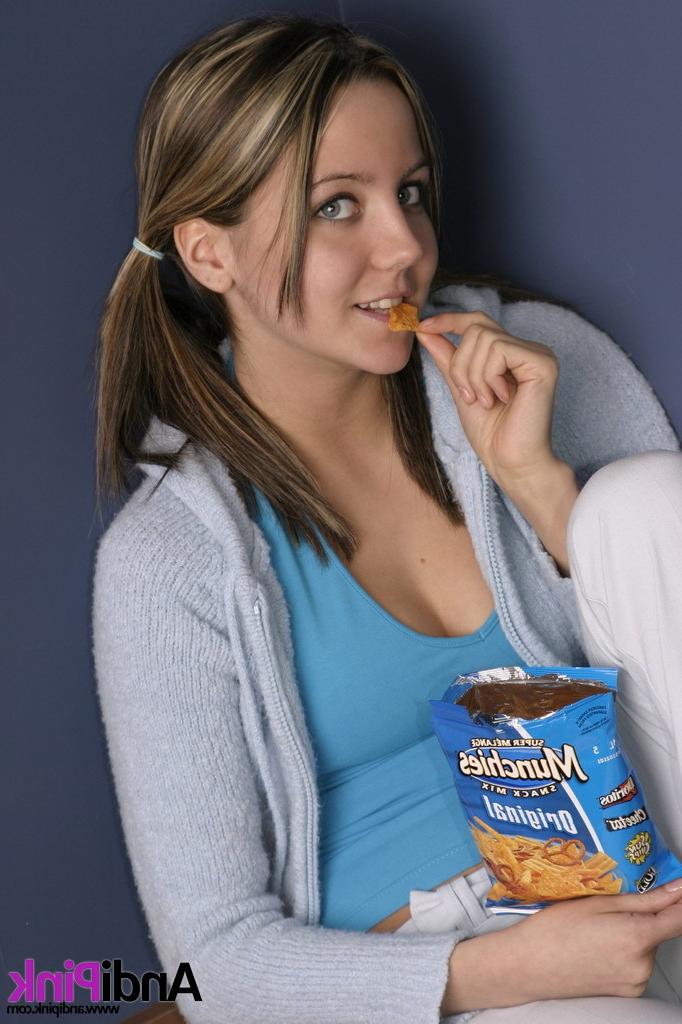 16P Cute teen girl eats chips