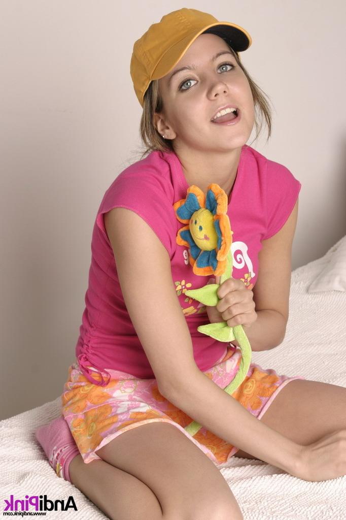 16P Cute teen girl wearing hat