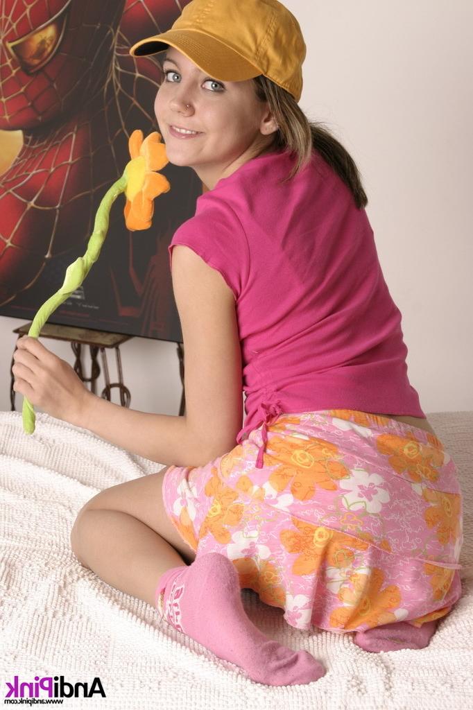 16P Cute teen girl wearing hat