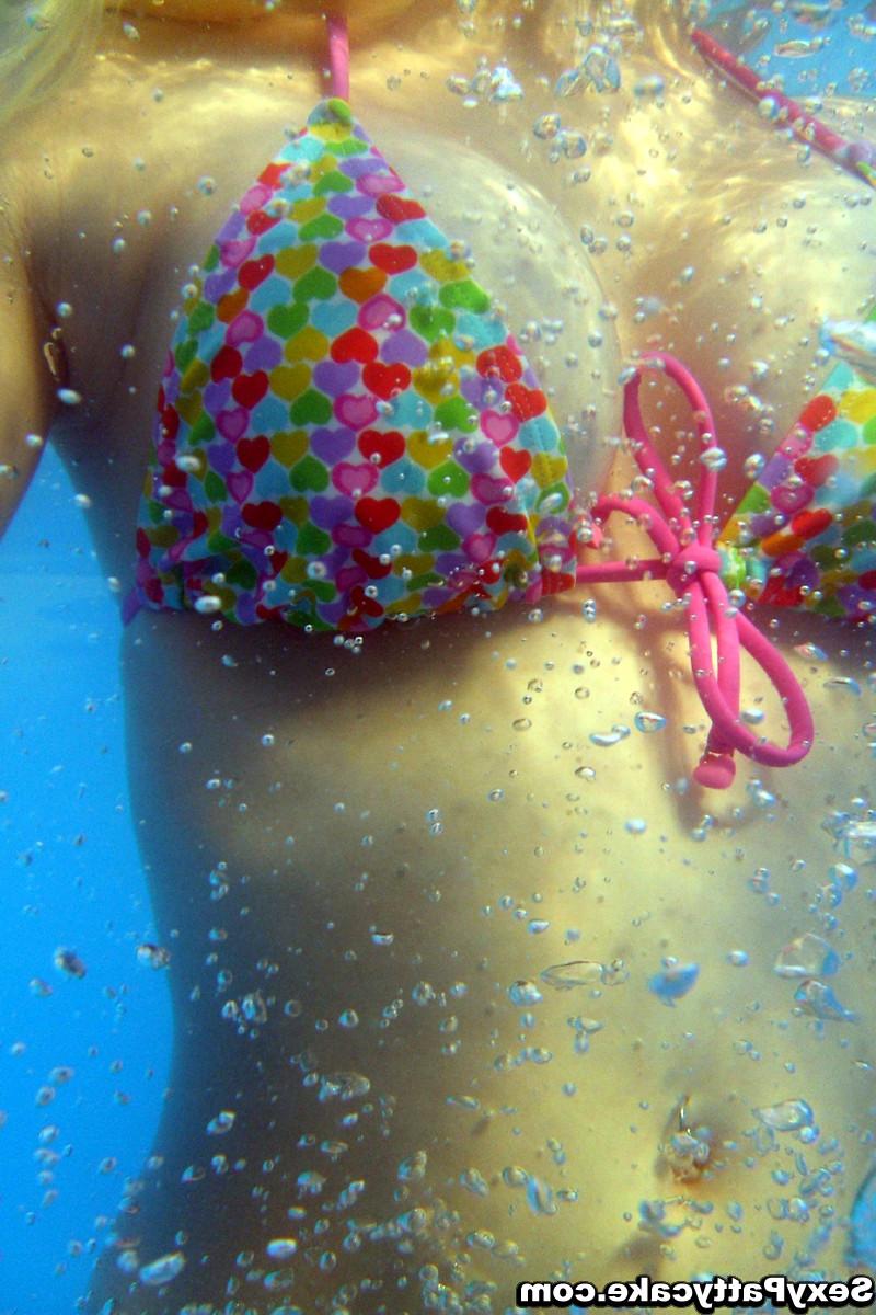16P Get underwater shots of busty Pattycake pulling down her bikini top and bottoms