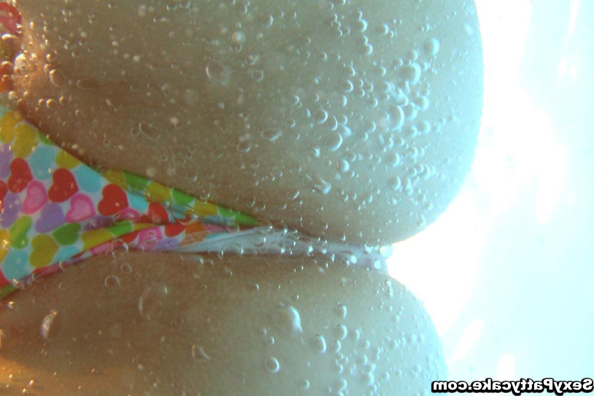 16P Get underwater shots of busty Pattycake pulling down her bikini top and bottoms