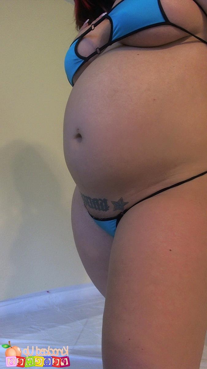 12P Georgia Peach teases in a tweenie weenie string bikini
