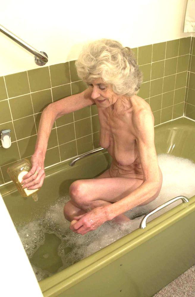 11P very old granny taking a bath