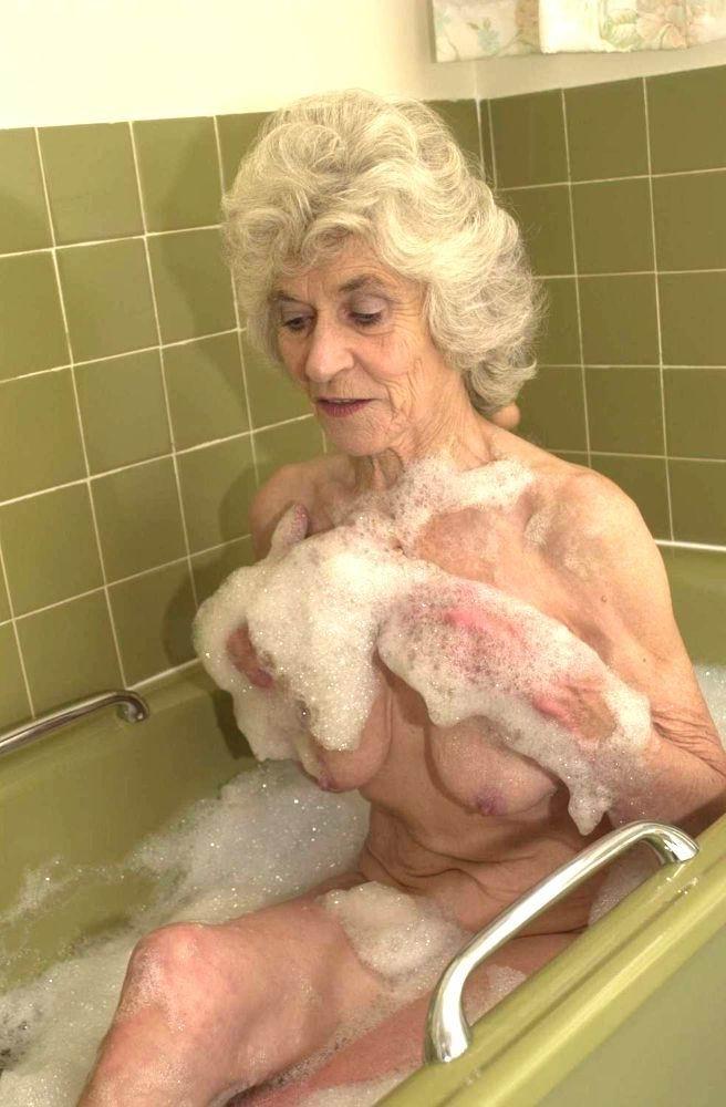 11P very old granny taking a bath