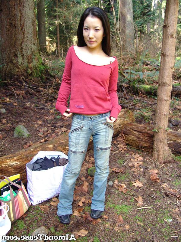 14P Almond Tease outdoors changing into mini skirt