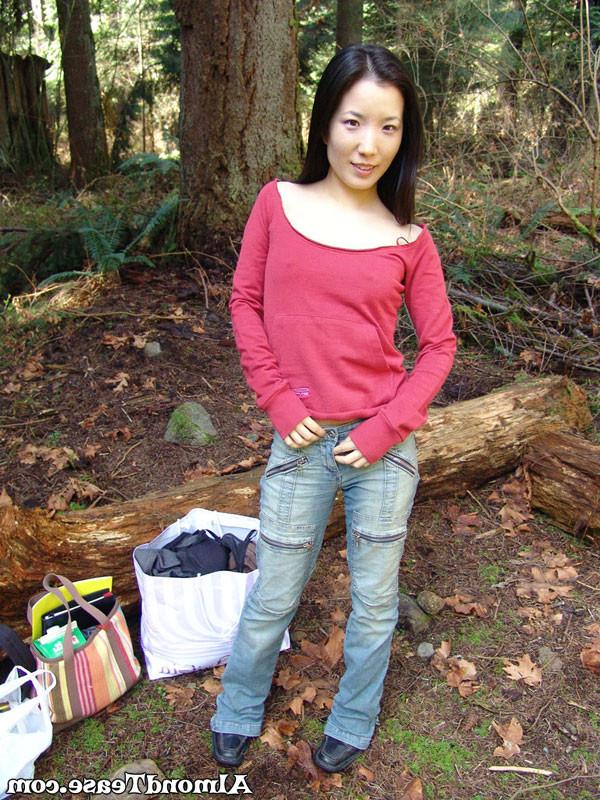 14P Almond Tease outdoors changing into mini skirt