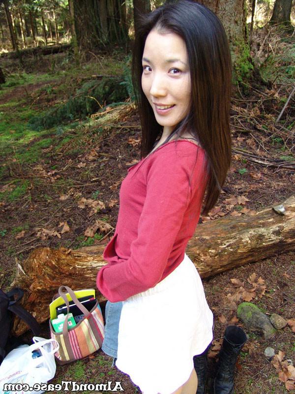 14P Almond Tease outdoors changing into mini skirt