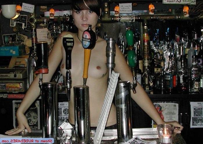 15P Barmaid strips behind the bar