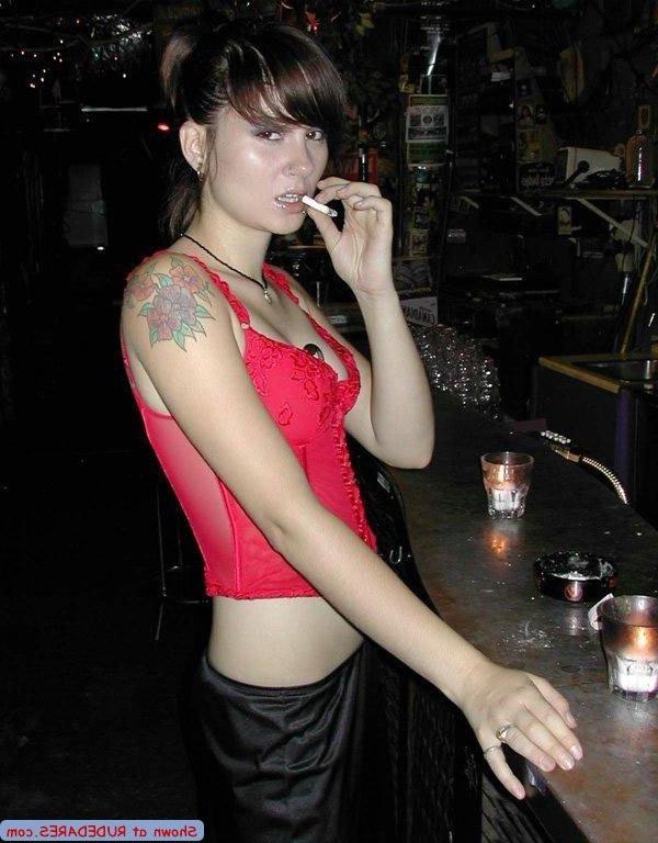 15P Barmaid strips behind the bar