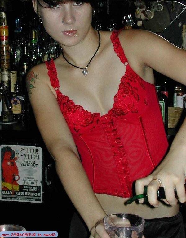 15P Barmaid strips behind the bar