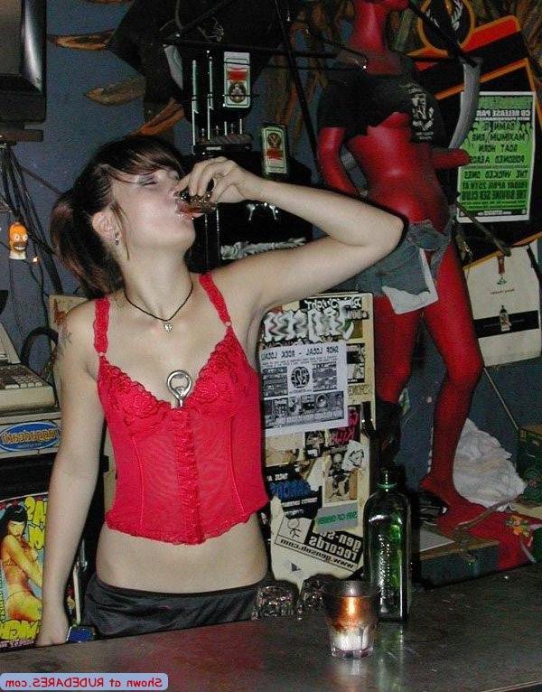 15P Barmaid strips behind the bar