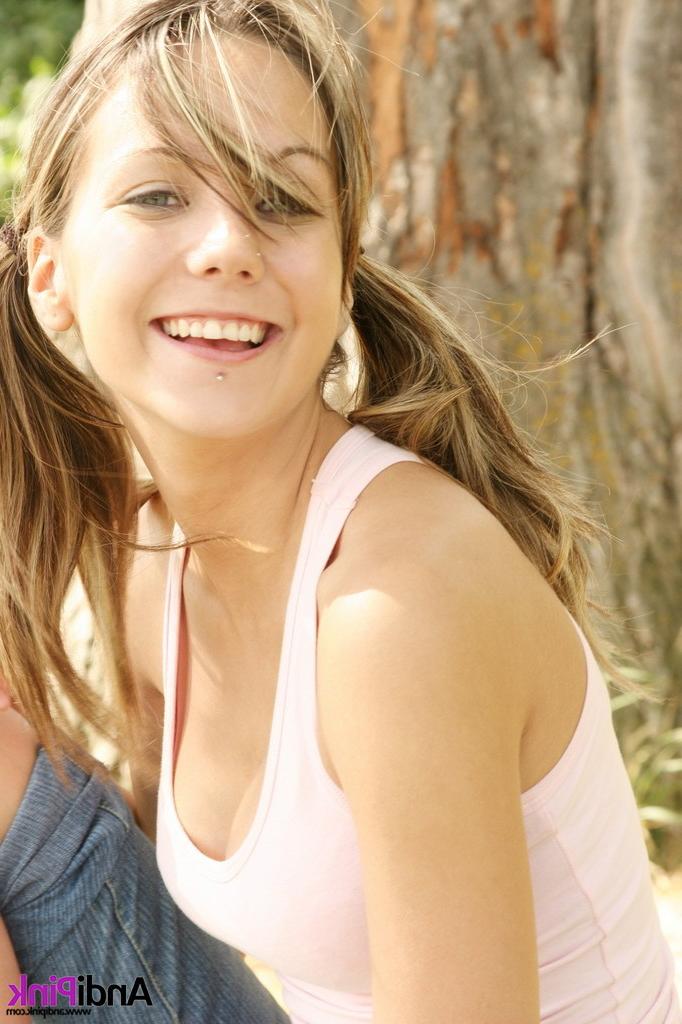 16P Cute teen girl topless outdoors