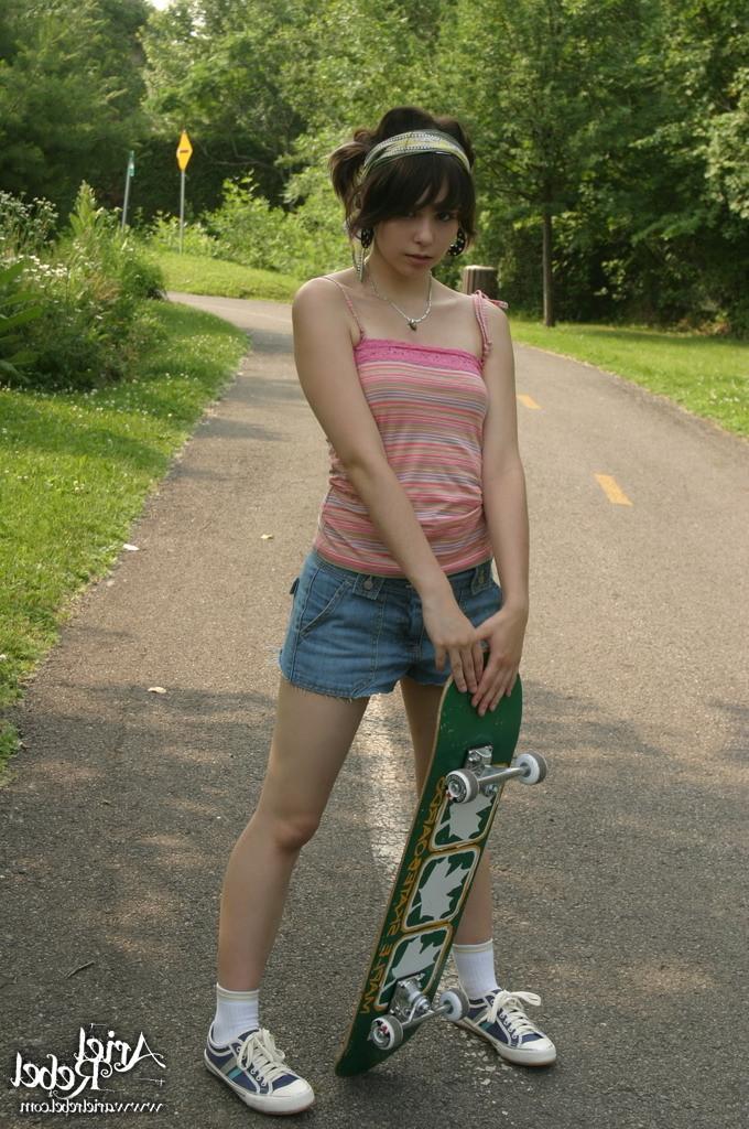 16P Skateboard teen girl outside