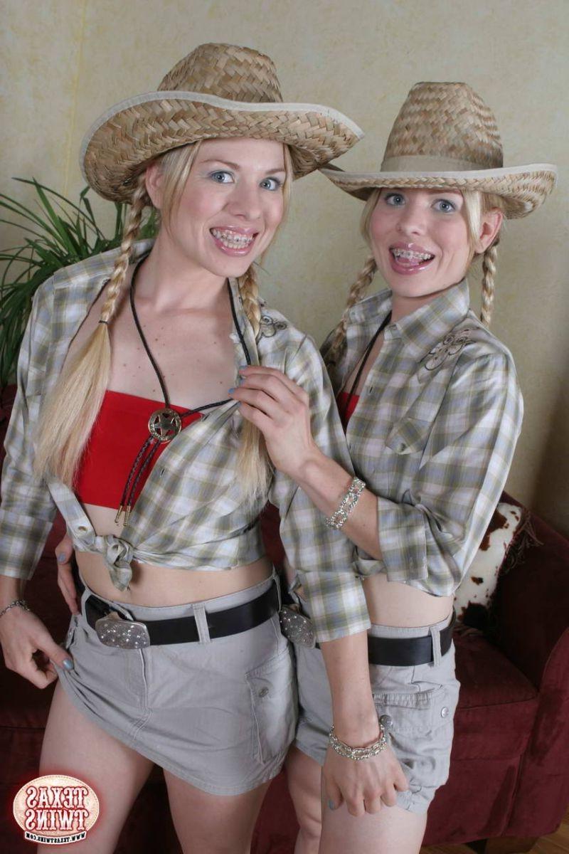 16P Texas twins taking top and tiny panties off to have fun on a red sofa