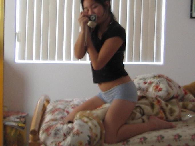 15P Girl plays with camera in her room for some selfpics