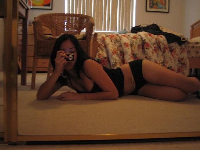 15P Girl plays with camera in her room for some selfpics