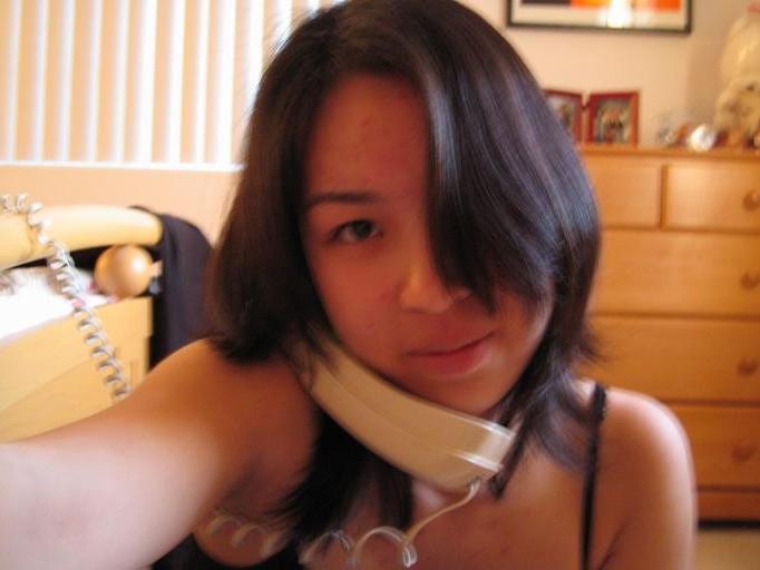 15P Girl plays with camera in her room for some selfpics