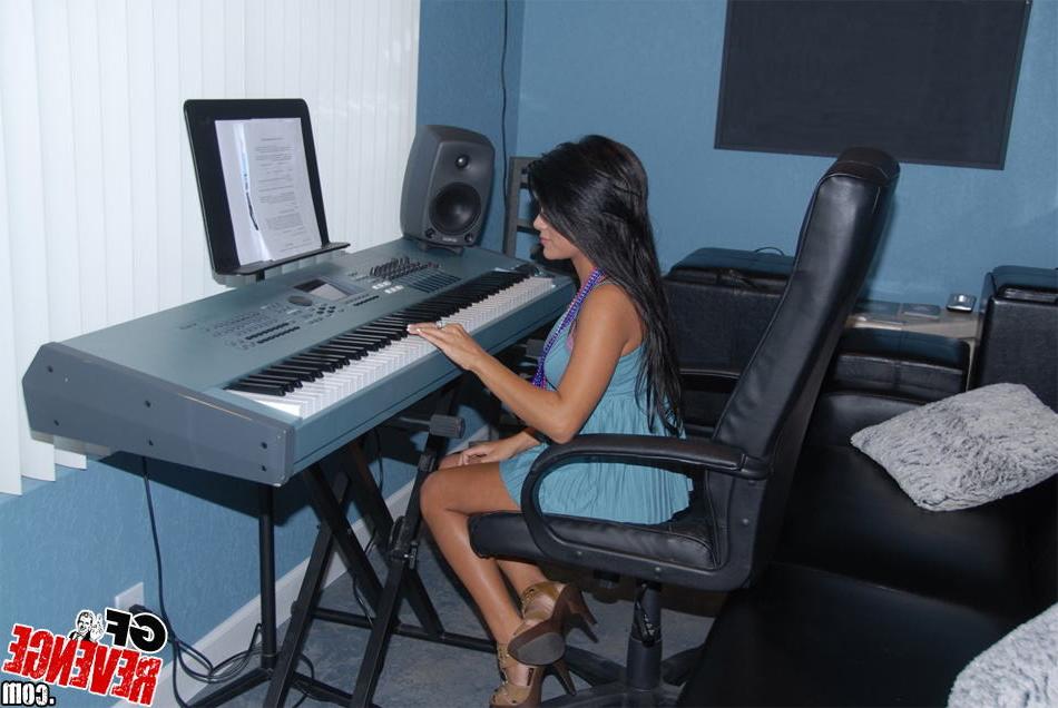 15P Amateur brunette girlfriend with big tits plays keyboard topless