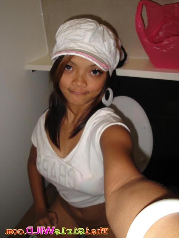 16P Hot Thai teen named Miy flashing tits and pussy outside then self shots
