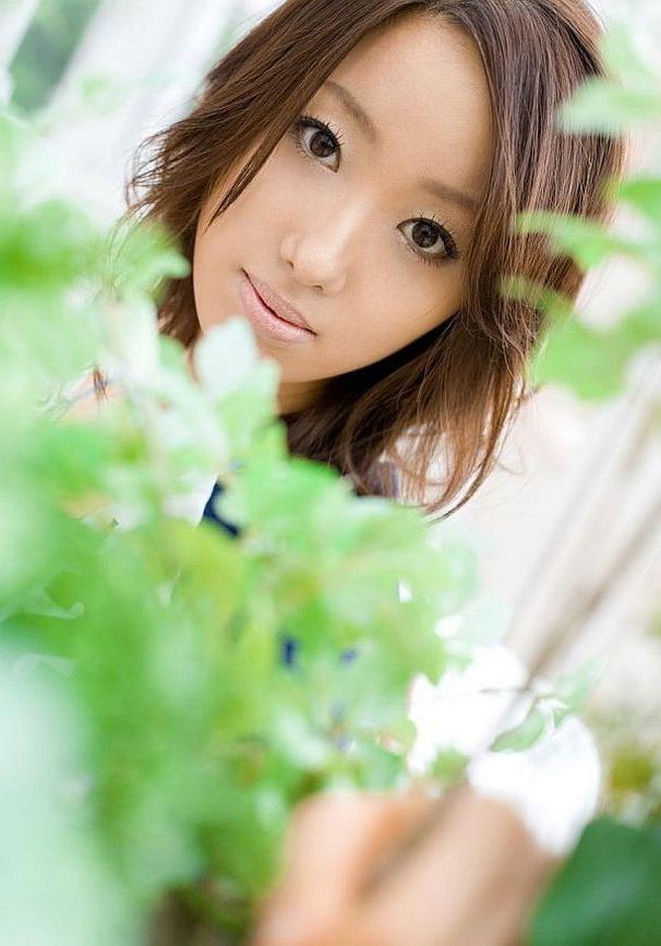 15P Japanese babe Jun Kiyomi shows tits poses outdoors