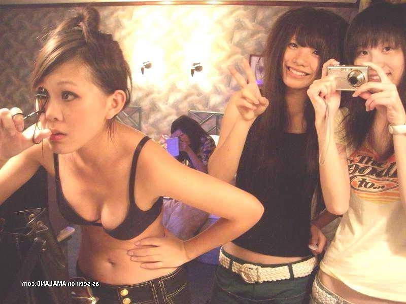 15P Naughty Korean chicks posing naked in a hotel room