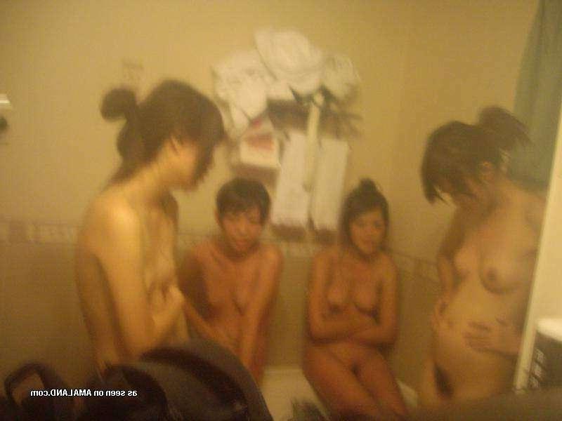 15P Naughty Korean chicks posing naked in a hotel room