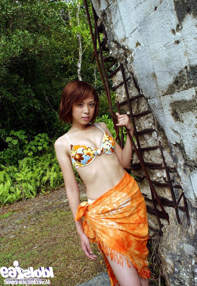 16P Japanese bikini girl outdoors