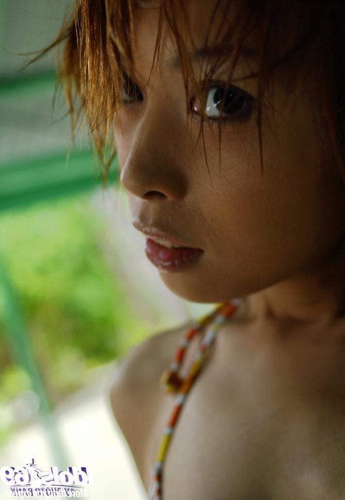 16P Japanese bikini girl outdoors