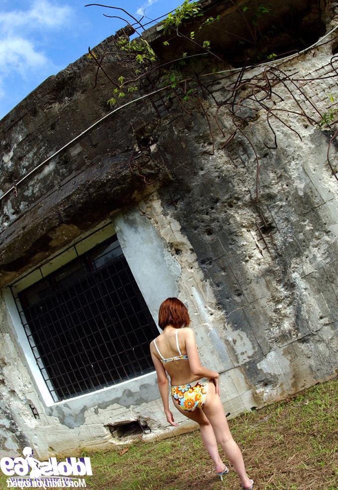 16P Japanese bikini girl outdoors