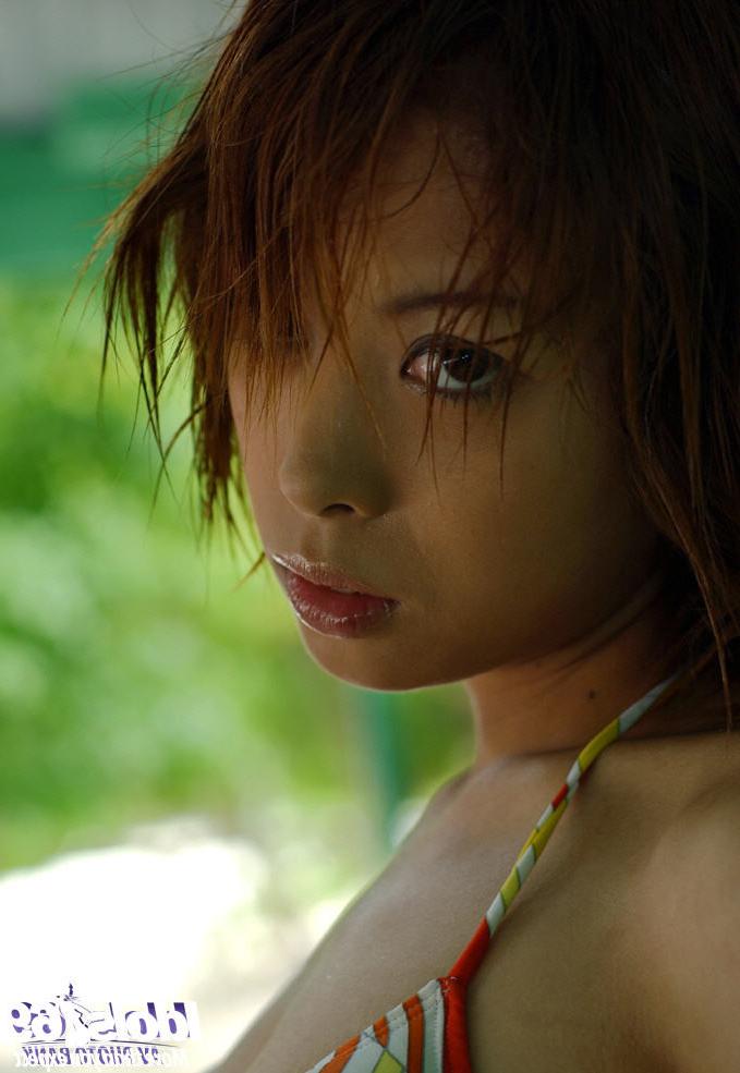 16P Japanese bikini girl outdoors