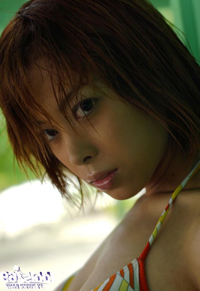 16P Japanese bikini girl outdoors