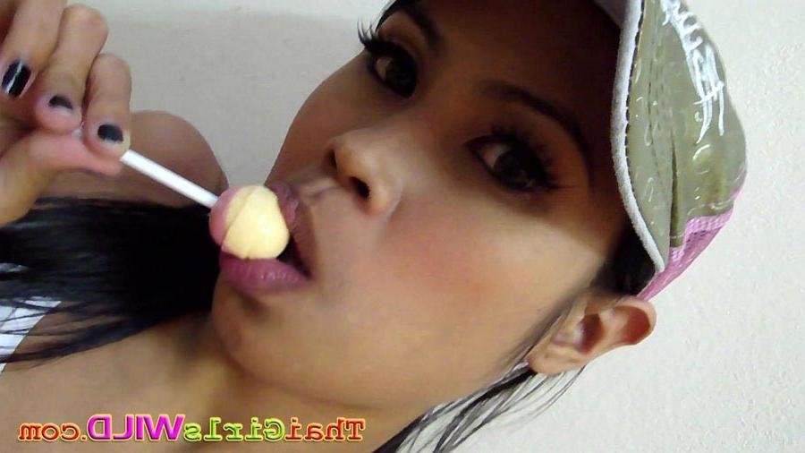16P Hot THai babe named Ni licks and sucks a lolipop to tease us