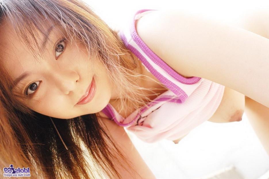 15P Busty japanese Rio Karusu showing body and titties