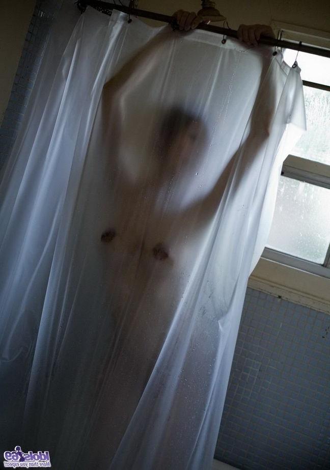 15P Cute japanese teen Emi Harukaze poses showing tits